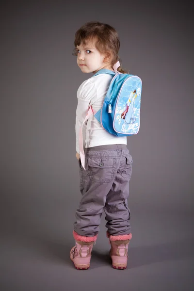 Little girl with a backpack — Stock Photo, Image