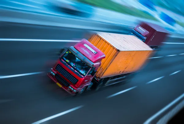 Motion trucks on the freeway — Stock Photo, Image