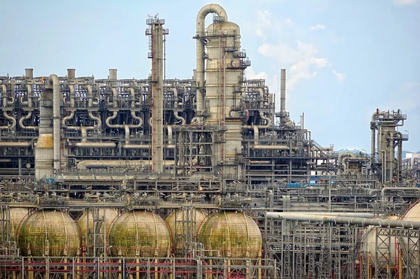 Industrial landscape with chimneys tank — Stock Photo, Image