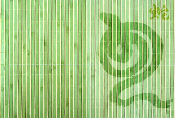 Китайский год змеи на бамбуковом фоне — стоковое фото