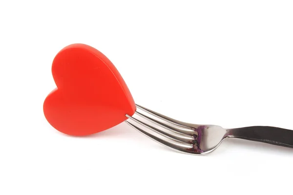 Red hear?with fork on white background — Stock Photo, Image