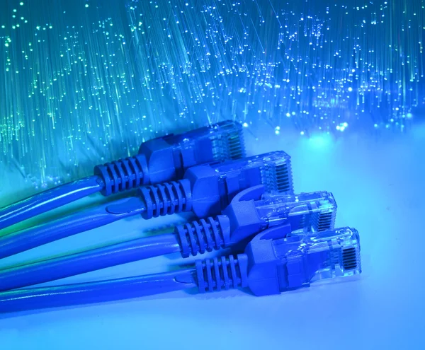 Sieć kabel zbliżenie z włókna optyczne tło — Zdjęcie stockowe
