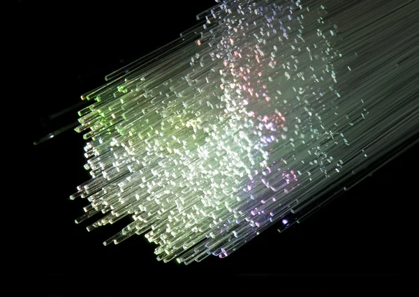 Glasvezelkabel dienen met technologie stijl tegen fiber optic achtergrond — Stockfoto