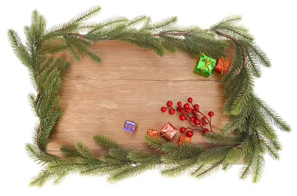 Tak van kerstboom houten achtergrond — Stockfoto