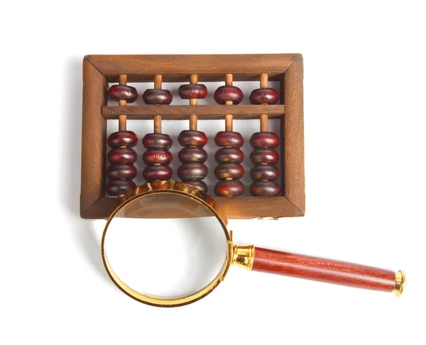 Chinese abacus and Magnifying glass,business concept — Stock Photo, Image