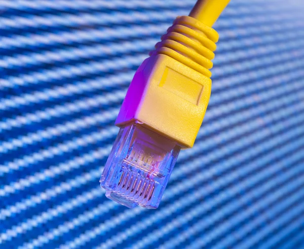 Netwerkkabel met hightech technologie kleur achtergrond — Stockfoto