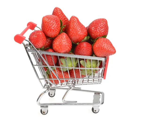 Shopping cart filled with fresh strawberries isolated over white — Stock Photo, Image