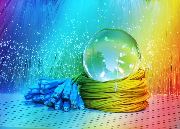 Wereld kaart technologie stijl tegen fiber optic achtergrond — Stockfoto