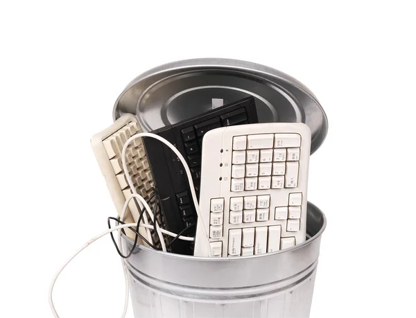 Different computer parts in trash can — Stock Photo, Image