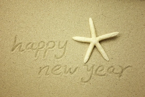 Messaggio di Capodanno sulla spiaggia di sabbia — Foto Stock