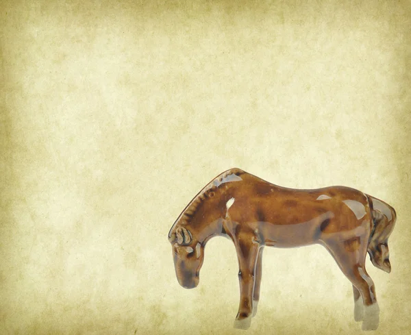 Ceramiczny koń z pamiątkami na stary papier, 2014 jest rok konia — Zdjęcie stockowe