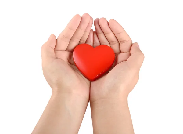 Ręce trzymające czerwone serce — Zdjęcie stockowe