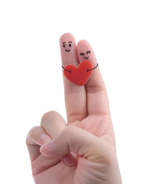 Gelukkige paar in liefde met geschilderde smiley en knuffelen — Stockfoto