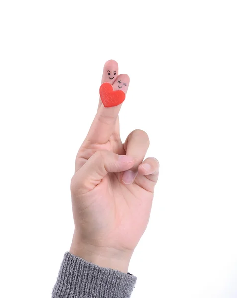 Gelukkige paar in liefde met geschilderde smiley en knuffelen — Stockfoto