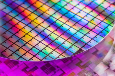 Elektronikte entegre devrelerin üretimi için kullanılan mikroçipli Silikon Wafer.