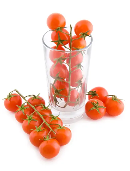 Small tomatoes in a glass — Stock Photo, Image