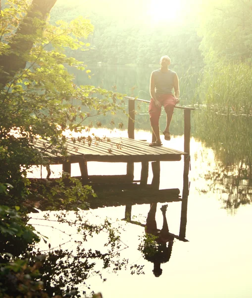 Man on the lake — Stock Photo, Image