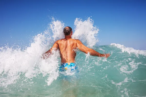 Man in wave — Stock Photo, Image