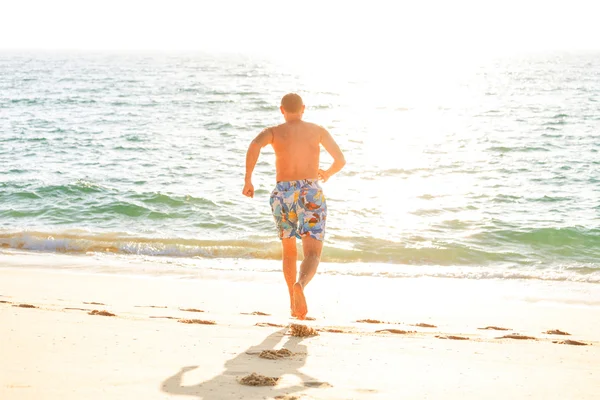 Man on beach — Stock Photo, Image