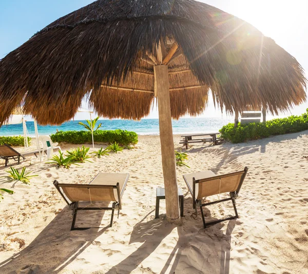 Beach with umbrella — Stock Photo, Image