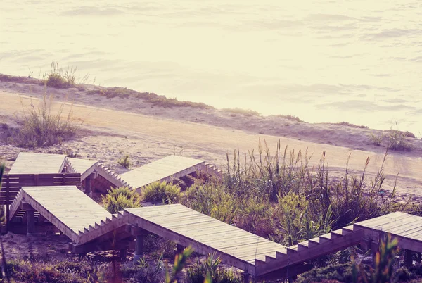 Boardwalk on beach — Stock Photo, Image