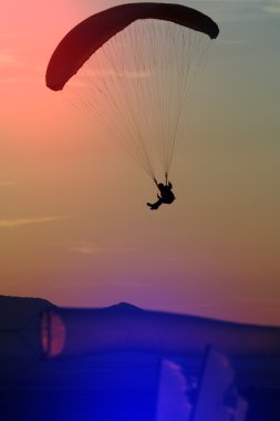 Paraglider in sky clipart