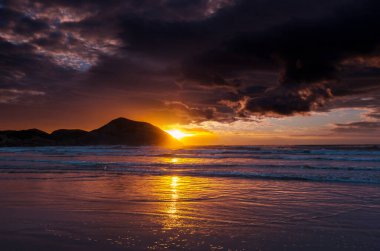 Ocean Beach, Yeni Zelanda 'da güzel manzaralar var. İlham verici doğal ve seyahat geçmişi