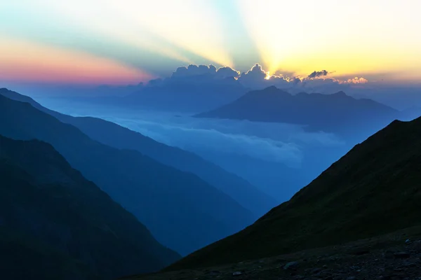 Sunset in mountains — Stock Photo, Image