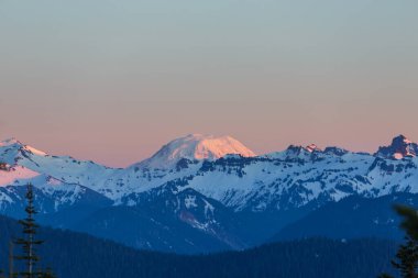 Scenic Sunset in the mountains. Beautiful natural background. Adams peak in Washington, USA