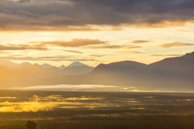 Beautiful high mountains in Alaska, United States. Amazing natural background.