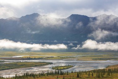 Beautiful high mountains in Alaska, United States. Amazing natural background.