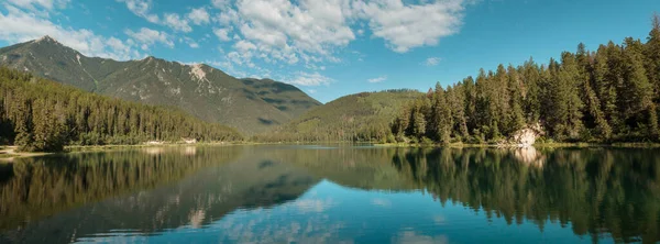 Serene scene by the mountain lake in Canada