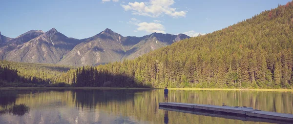 Serene scene by the mountain lake in Canada