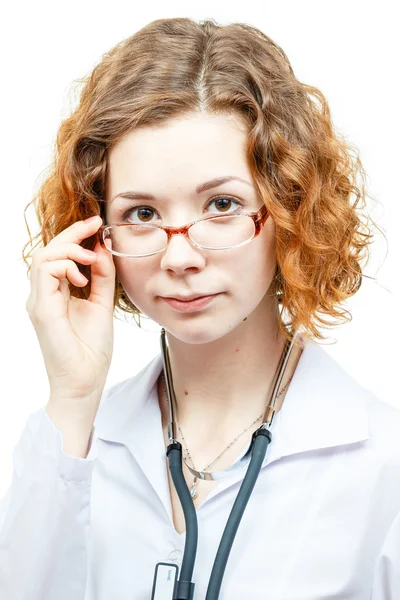 Cute redhead doctor in lab coat with glasses — Stock Photo, Image