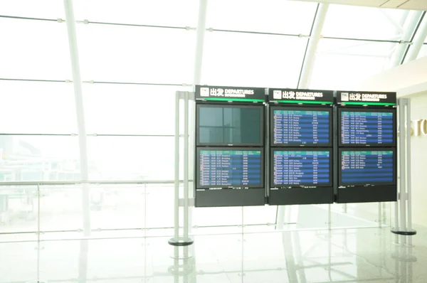 The passenger departure board of an airport — Stock Photo, Image