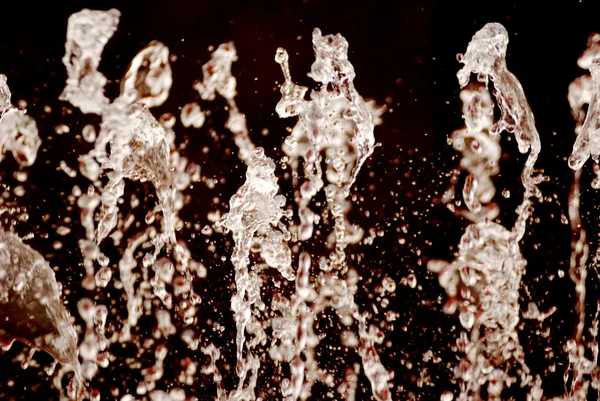 Water splashes isolated on black background — Stock Photo, Image