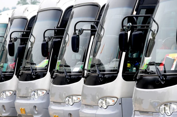 Tourist buses on a parking expect passengers — Stock Photo, Image