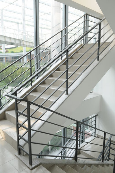 The modern building with indoor corridor and bamboo garden.