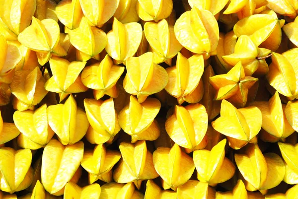 Carambola fruits pile background — Stock Photo, Image