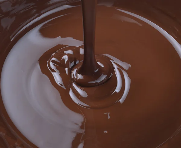 Lots of chocolate falling from above — Stock Photo, Image