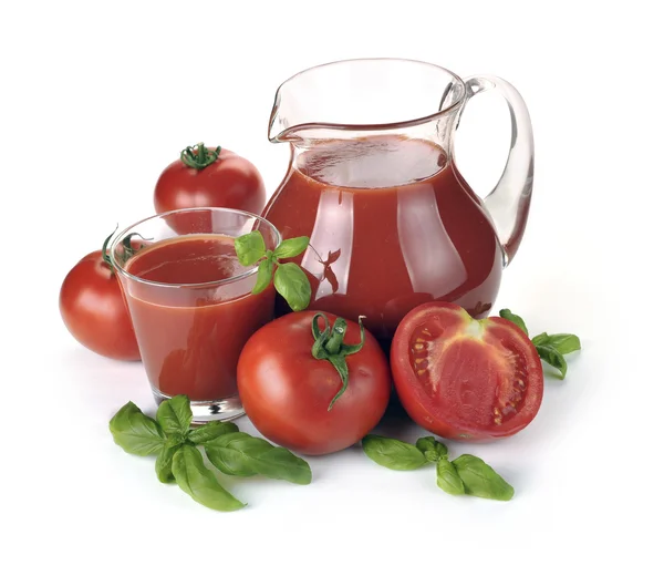 Jug, glass of tomato juice and fruits — Stock Photo, Image