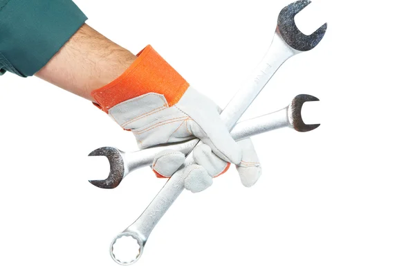 Hand with spanner — Stock Photo, Image
