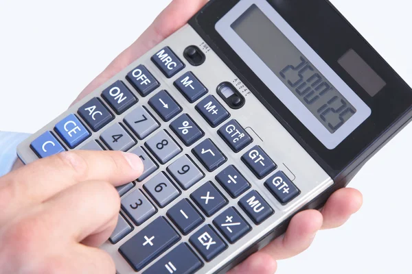 Бизнесмен и калькулятор — стоковое фото