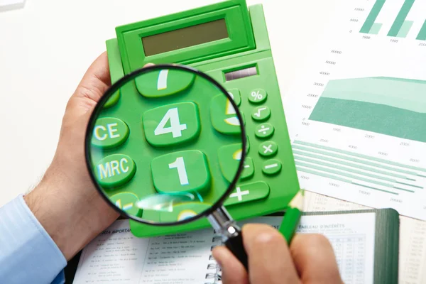 The businessman and magnifier — Stock Photo, Image