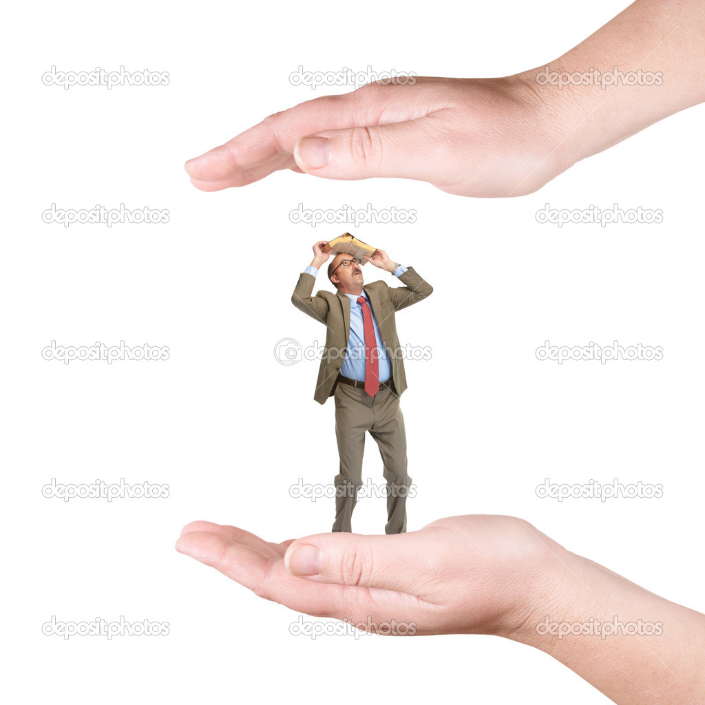 The businessman is hidden on a palm