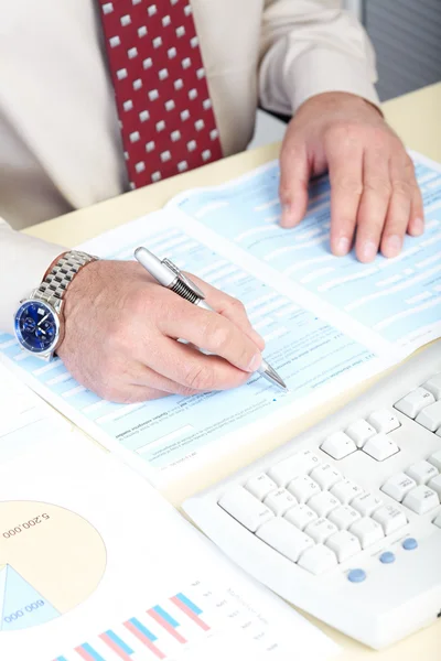 The businessman works at office — Stock Photo, Image