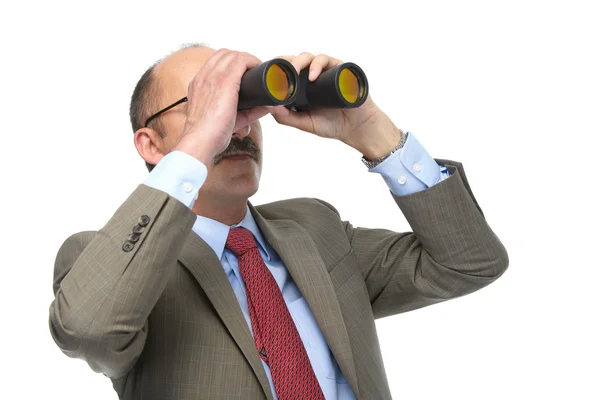 El hombre de negocios mira en los prismáticos —  Fotos de Stock