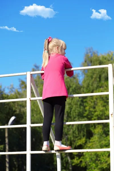 The girl on playground — Stock Photo, Image