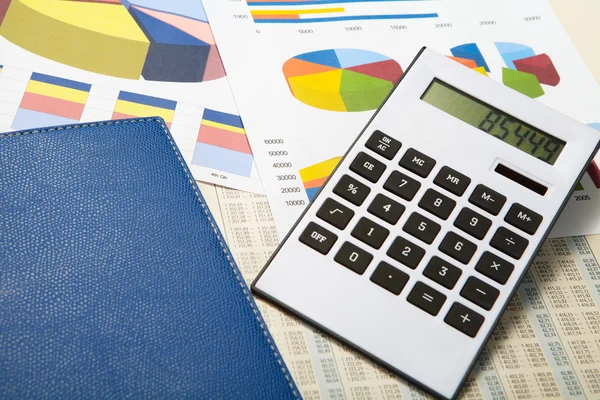 Calculator and documents and money on a business background — Stock Photo, Image