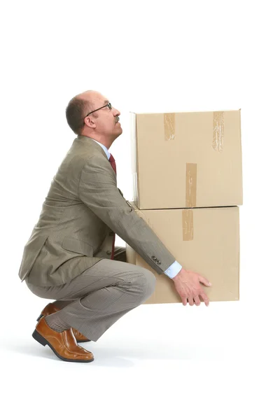 Businessman with a handcart — Stock Photo, Image